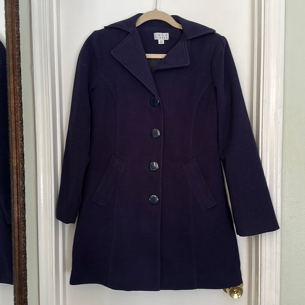 Joan rivers navy blue coat size xxs. 93% polyester 5% rayon 2% spandex